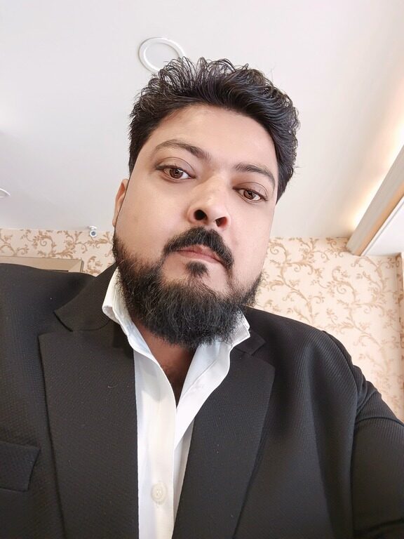 Mohd Tayyab Ahmad standing on a rooftop terrace